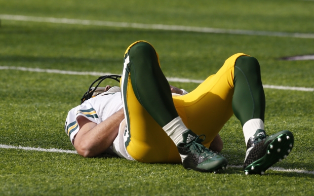 ap-jim-mone-aaron-rodgers-hurt.jpg