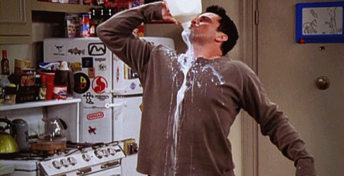 friends-joey-drinking-milk-spill-on-shirt-gif.gif